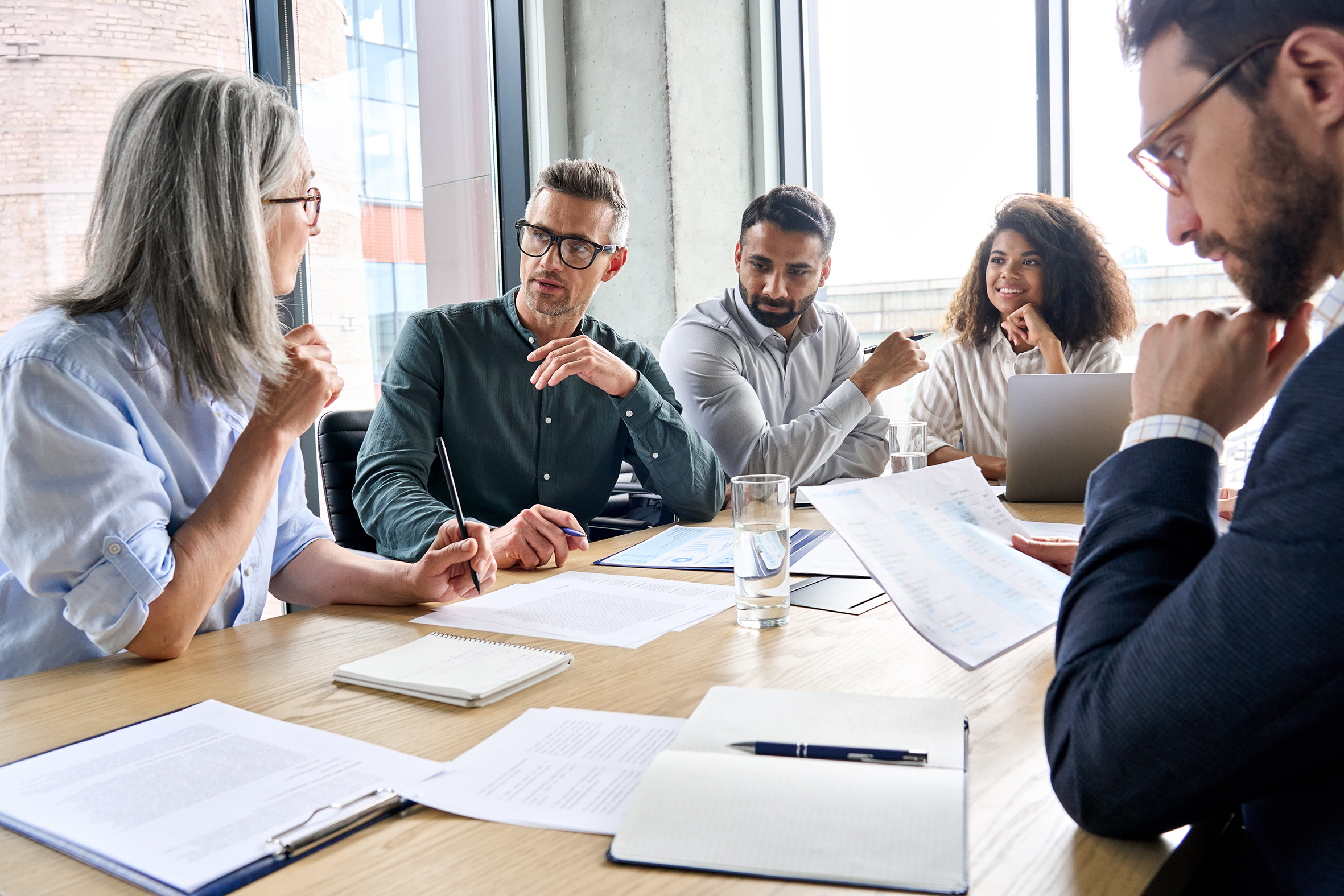 international-business-executive-team-having-discussion-at-boardroom-meeting